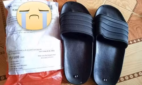 Sản phẩm nhận được là đôi dép "lệch". Ảnh: FB Lê Xuân Phương.