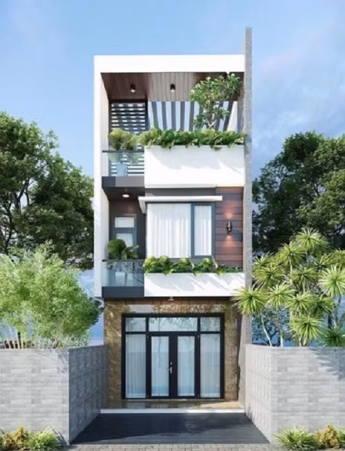  Nhà ống mặt tiền 4m ốp thêm các loại đá giả gỗ nhằm tạo sự gần gũi, chống được bụi và sạch sẽ hơn. Ảnh: Thietkenhadepmoi.