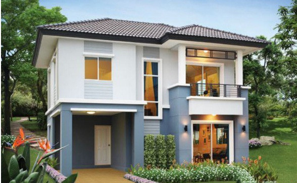 Để tạo điểm nhấn và độ thoáng mát, kiến trúc sư đã linh hoạt kết hợp màu lam ở các mảng tường trang trí tầng trệt ngôi nhà 2 tầng. Phần thân ngôi nhà cũng được thiết kế tạo hình khá vuông vức. Ảnh: Nhadat.