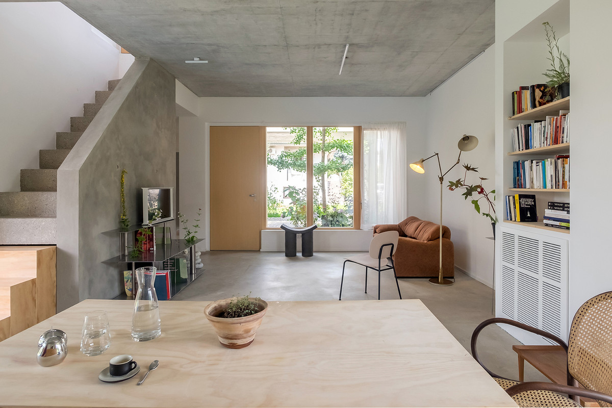 Trần xi măng trong trang trí nội thất hiện đại tạo cảm giác về một căn nhà rộng hơn và cao hơn nhưng vẫn mang lại sự ấm cúng.