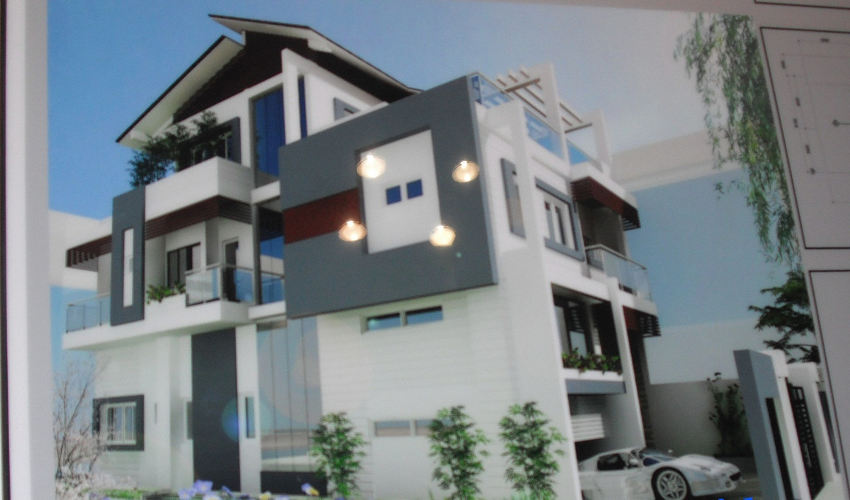 Nhà phố ấn tượng với những đường nét mạnh mẽ, gam màu xám xanh và trắng chủ đạo. Ảnh: Noithatxanh.