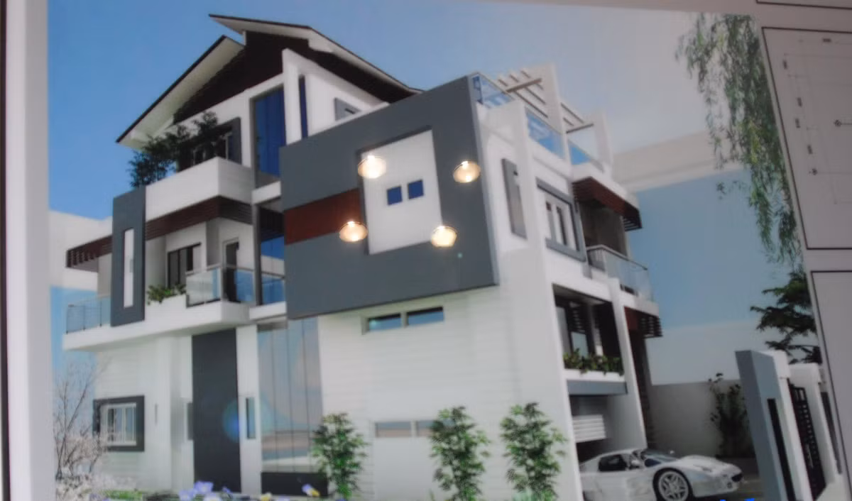 Nhà phố ấn tượng với những đường nét mạnh mẽ, gam màu xám xanh và trắng chủ đạo. Ảnh: Noithatxanh.