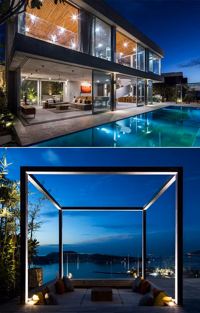 Phía sau biệt thự là một bể bơi lớn trước biển.