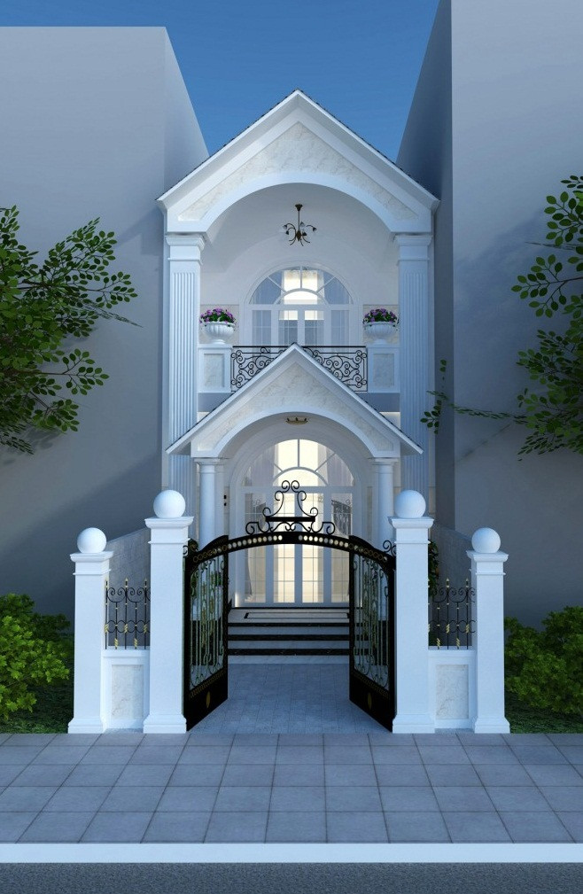 Nhà phố 2 tầng sang trọng với màu sáng chủ đạo và họa tiết cổng, lan can ban công đậm chất cổ điển. Ảnh: Nhavietxanh.