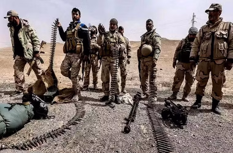 Trong ảnh là các binh sĩ thuộc lực lượng dân quân “Đại bàng sa mạc” một trong những đơn vị có công rất lớn trong chiến dịch giải phóng Palmyra và Al-Qaryatayn. Nguồn ảnh: Ria Novosti