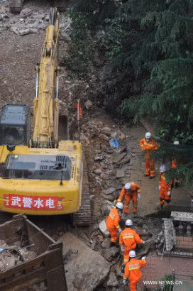 Sap chung cu 9 tang o Trung Quoc, 16 nguoi chet-Hinh-2