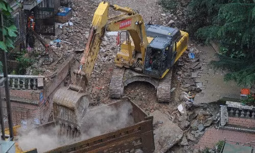 Sap chung cu 9 tang o Trung Quoc, 16 nguoi chet-Hinh-5