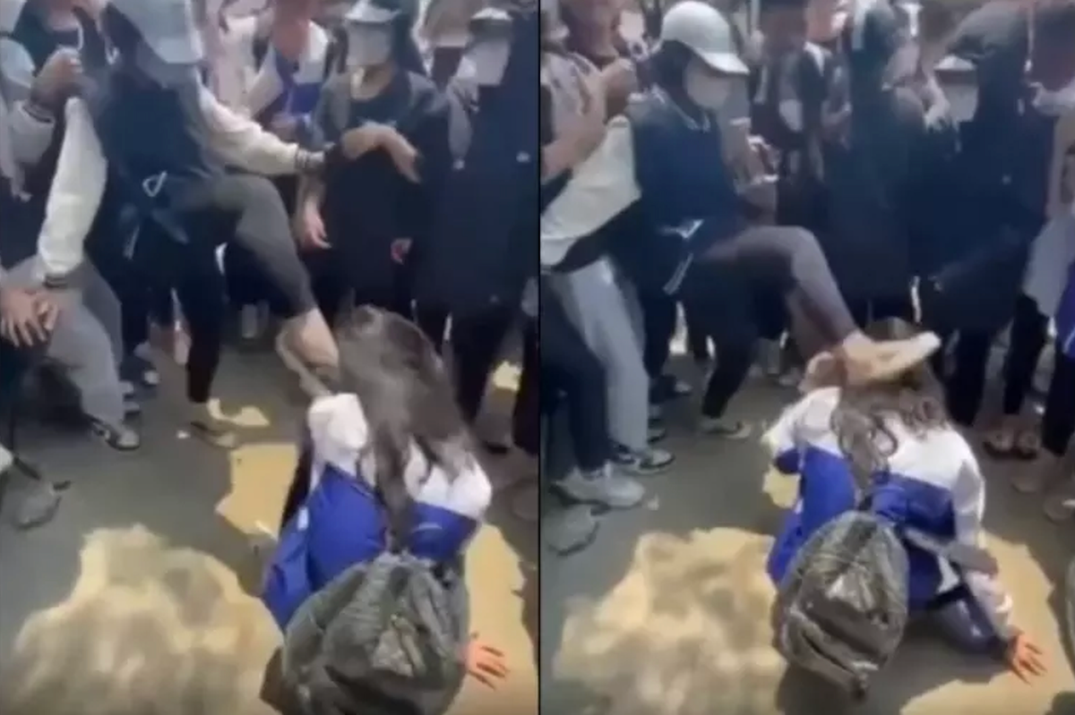  Nữ sinh ở Thanh Hoá bị đánh hội đồng dã man sau giờ học: Trưa 8/4/2022, nữ sinh T.T.A (lớp 10, Trường THPT Đào Duy Từ) bị nhóm bạn ép đi theo ra khu vực vắng người rồi thực hiện đánh hội đồng. Nhóm học sinh đã có các hành động bạo lực như giật tóc, đấm, đá, đạp vào mặt và dùng mũ bảo hiểm đập đánh vào phần đầu của A. Nguyên nhân vụ việc là do trong quá trình quan hệ bạn bè đã xảy ra mâu thuẫn, nói xấu và thách thức nhau. (Ảnh: Cắt từ clip)