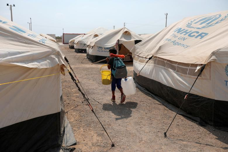 Tan muc cuoc song nguoi nhap cu Venezuela noi “xu nguoi“