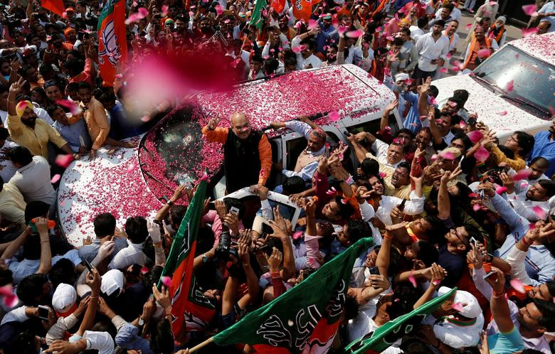 Chủ tịch BJP Amid Shah trên đường tới trụ sở của đảng này sau khi biết kết quả bầu cử ở thủ đô New Delhi.