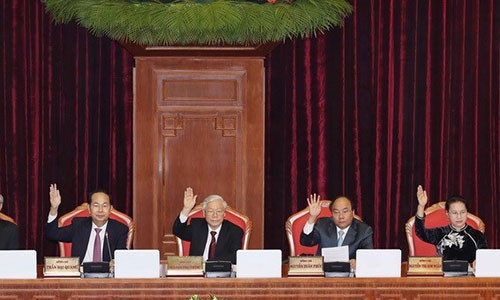 Hội nghị Trung ương 7 ban hành Nghị quyết cải cách chính sách tiền lương và Nghị quyết cải cách chính sách BHXH - Ảnh: TTXVN