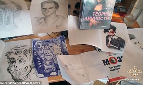 Tranh vẽ và sách ảnh kỳ dị cho là liên quan đến những vụ tự tử được tìm thấy trong nhà của nữ sinh 17 tuổi chủ trì hội nhóm cổ vũ người trẻ tự tử. Ảnh: Daily Mail.