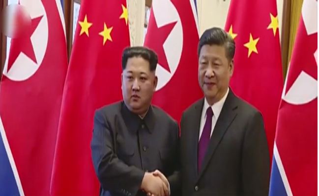 Ông Tập Cận Bình trở thành nhà lãnh đạo Trung Quốc đầu tiên thăm Triều Tiên trong vòng 14 năm qua. Ảnh chụp màn hình.