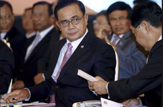 Ba tháng sau cuộc đảo chính do ông Prayut lãnh đạo hồi tháng 5/2014, Cơ quan lập pháp chính quyền quân sự Thái Lan đã quyết định bổ nhiệm Tướng Prayut Chan-o-cha làm Thủ tướng nước này. Ảnh: ABC.