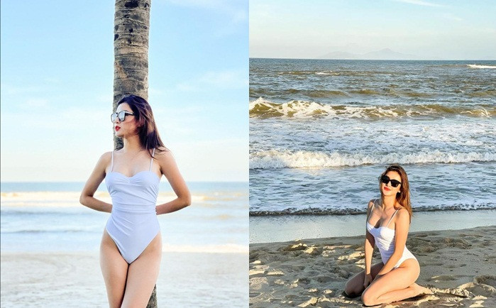 Trong chuyến du lịch đầu năm ở Đà Nẵng, Á hậu Huyền My diện bikini trắng đơn giản và khoe đường cong nóng bỏng.