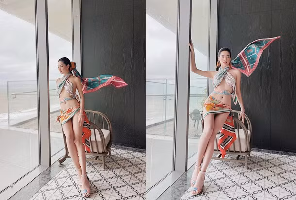 Vòng eo con kiến, dáng vóc nuột nà của Lương Thùy Linh được tôn lên hết mức trong bộ đồ làm hoàn toàn từ khăn lụa.