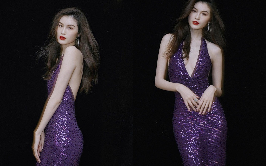 Vốn ưa chuộng mốt đầm yếm, siêu mẫu gốc Hoa khoe trọn lưng trần và đường cong "thắt đáy lưng ong".