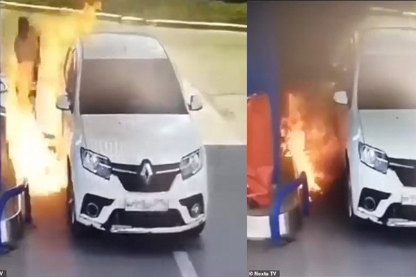 Hut thuoc khi dang do xang, tai xe suyt bien thanh “duoc song”