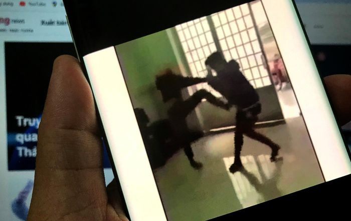 Nu sinh lop 6 bi danh, bat quy xin loi