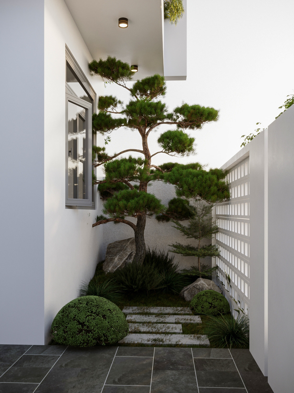 Khoảng vườn nhỏ ở sân cổng tạo thành màng lọc bụi cho phía trong. Dù là diện tích nhỏ nhưng nhóm kiến trúc sư vẫn cố gắng tạo ra không gian đẹp, bố trí tiểu cảnh khoa học.