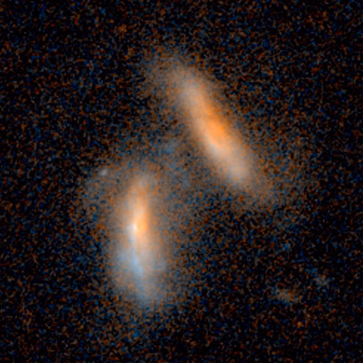 Cận cảnh hai thiên hà nằm cách Trái đất tới 2 tỷ năm ánh sáng đang trong quá trình sáp nhập.