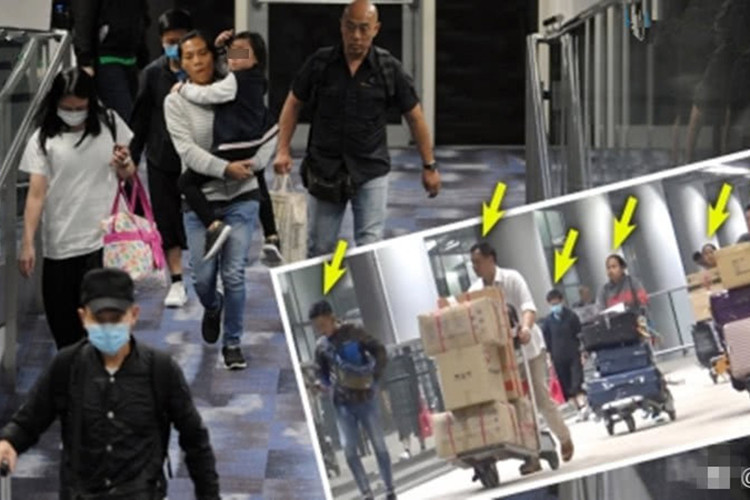 Gần đây, Thiên vương Hong Kong huy động đến 12 quản lý, vú em để hộ tống vợ con ở sân bay. Ảnh: Sohu
