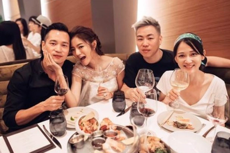 Giữa ồn ào, vợ chồng An Dĩ Hiên vẫn tình cảm bên nhau. Ảnh: On