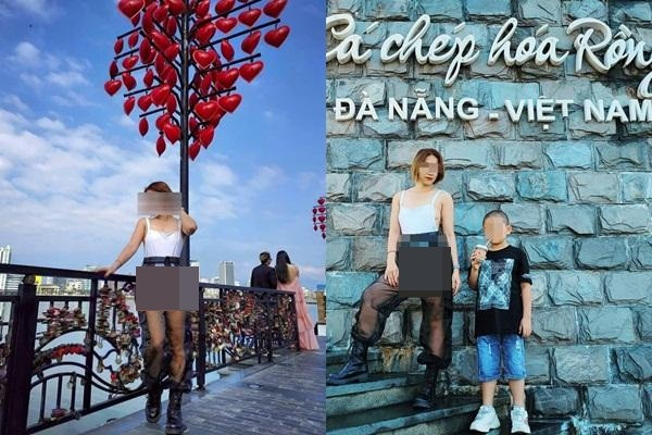 Địa điểm chị L.B.C và con ghé thăm chính là cầu Rồng (Đà Nẵng). Sự xuất hiện của mẹ con chị C. khiến mọi người không ngừng chú ý bởi chính trang phục phản cảm của chị.