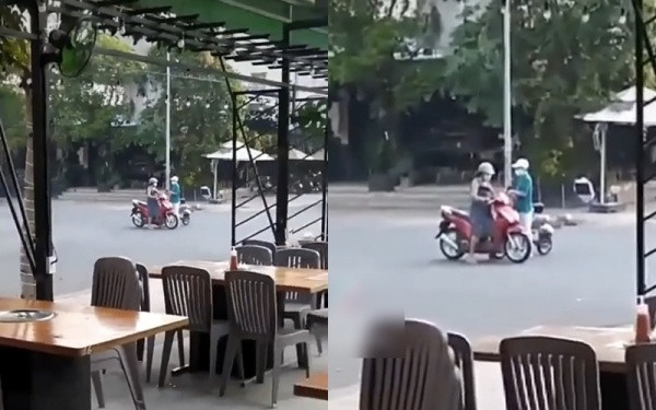 Hai phụ nữ này dừng xe ngay ngã tư đường rồi thản nhiên đứng “tám” chuyện một hồi lâu. Ý thức tham gia giao thông của họ lập tức trở thành đề tài bàn tán xôn xao.