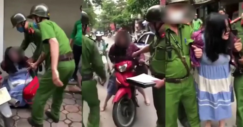 Vi pham giao thong, nguoi phu nu chong luc luong chuc nang gay xon xao