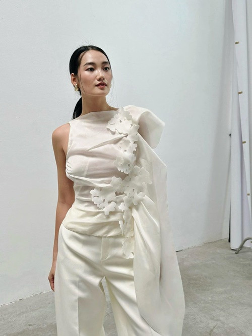 Nguyễn Quỳnh Anh - Á hậu 1 của Miss Universe Vietnam 2024 chia sẻ, gia đình cô có truyền thống trong ngành công an và bộ đội. Ảnh: FB Quỳnh Anh.