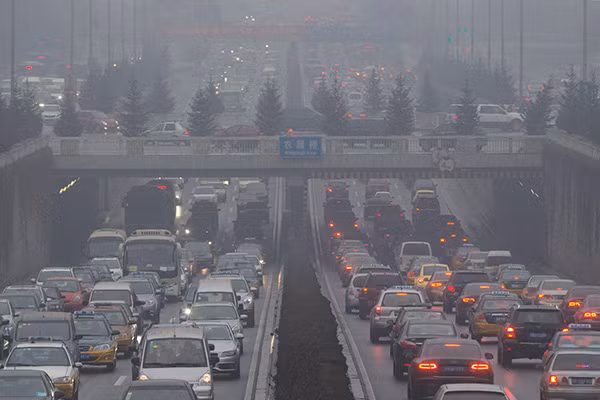 Qua o nhiem, Trung Quoc tich cuc ho tro xe xanh-Hinh-2