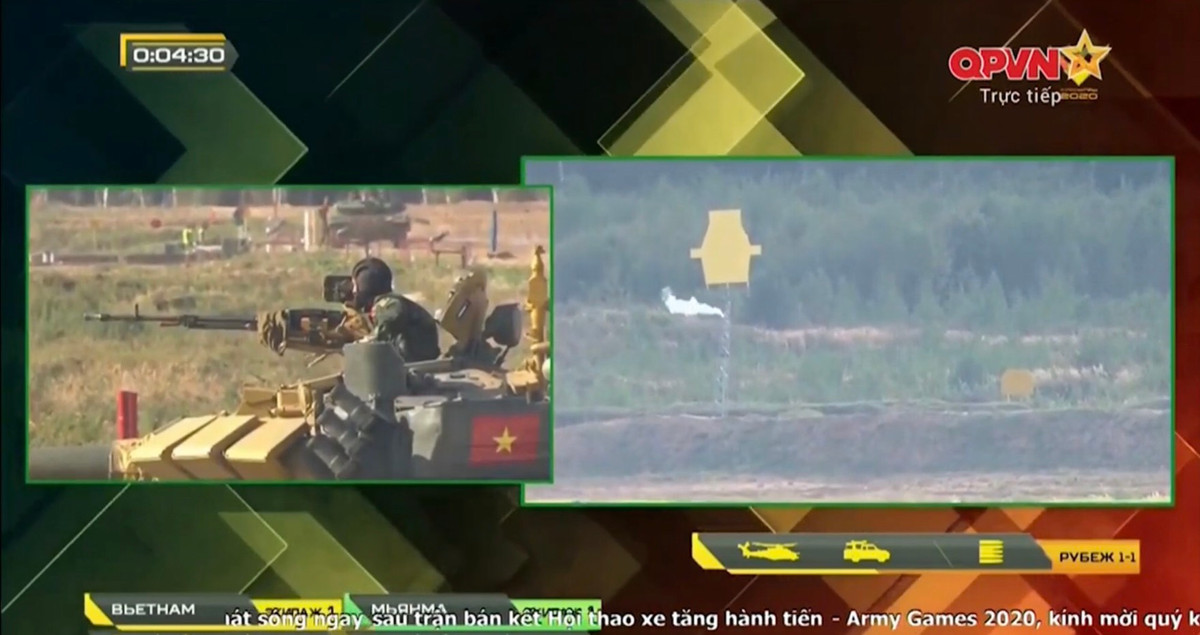 Về việc sử dụng súng máy 12.7mm tác xạ tiêu diệt mục tiêu bay bia số 25, các trưởng xe của đội tuyển QĐND Việt Nam đều làm rất tốt. Cả 6/6 mục tiêu bia số 25 trong kỳ thi năm nay từ vòng bảng cho đến vòng bán kết đều được các trưởng xe của ta tiêu diệt gọn gàng. Đây là sự tiến bộ vượt bậc so với năm ngoái khi súng máy phòng không không phải thế mạnh của đội ta. Ảnh: Trưởng xe đồng chí Đại úy Trần Việt Hải của kíp xe số 1 tác xạ chuẩn xác hạ gục bia số 25 tại vòng bán kết. 