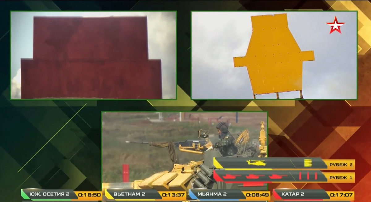 Bước vào vòng chạy thứ hai, trưởng xe đồng chí Vũ Bá Trọng với kinh nghiệm của mình đã tác xạ chính xác mục tiêu bia số 25 mô phỏng trực thăng đối phương bằng súng máy phòng không 12.7mm ngay từ loạt đạn đầu, sau đó đã nhanh chóng xả hết số đạn thừa để đảm bảo không gây mất an toàn thi đấu, kiểm tra súng và xe tiếp tục cơ động quay lại đường đua. Ảnh: Sau loạt đạn 12.7mm đầu tiên, mục tiêu bia số 25 của đội Việt Nam đã bốc khói vì trúng đạn.