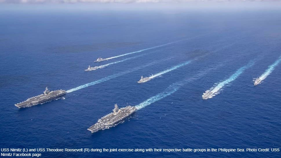 Sau một thời gian tạm nghỉ ở đảo Guam, tàu sân bay USS Nimitz và hạm đội hộ tống của nó, đã tiến hành một cuộc tập trận tàu sân bay đôi với đội hình tàu sân bay USS Reagan. Các hoạt động này bắt đầu ở Biển Philippines và bây giờ là Biển Đông. Ảnh: Tàu sân bay USS Nimitz và USS Theodore Roosevelt của hải quân Mỹ tập trận trên Biển Đông - Nguồn: Hải quân Mỹ.