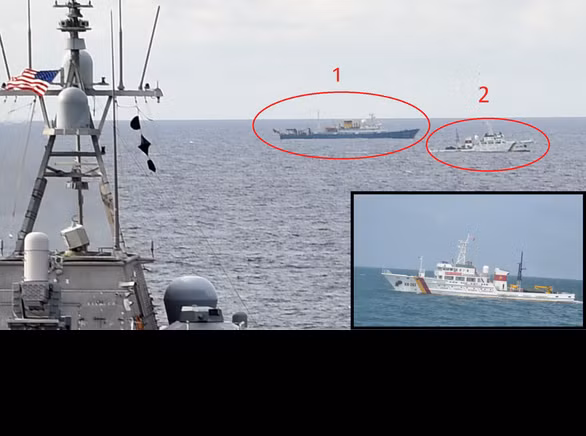 Hải quân Mỹ trong hôm 2/7 vừa qua đã công bố những hình ảnh về tàu tác chiến ven bờ LCS-10 USS Gabrielle Giffords trong một chuyến tuần tra thực hiện tự do hàng hải trên Biển Đông tại một khu vực không xác định đã có sự xuất hiện đầy bất ngờ với tàu khảo sát địa chất Hải Dương 4 của Trung Quốc. Không những thế, một tàu tuần tra của kiểm ngư Việt Nam cũng xuất hiện trong khu vực. Tàu khảo sát Hải Dương 4 của Trung Quốc, tàu kiểm ngư Việt Nam và tàu chiến Mỹ xuất hiện cùng nhau hôm 1-7 - Ảnh lớn: Hải quân Mỹ - Ảnh nhỏ: Một tàu kiểm ngư lớp KN-750 của Việt Nam