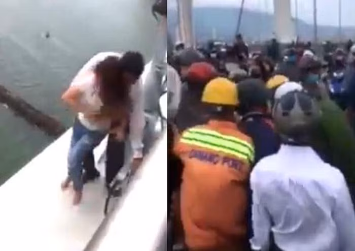 “Bé ơi, từ từ bé”, một người đàn ông nói. Nghe vậy, cô gái liền gỡ khẩu trang và ném đi nhưng vẫn đứng suy nghĩ có nên nhảy xuống sông Hàn hay không. Một người đàn ông mặc thường phục (chưa rõ có phải công an không) âm thầm leo qua lan can và cứu được cô gái. Cô cho biết do thất tình nên định nhảy cầu. 