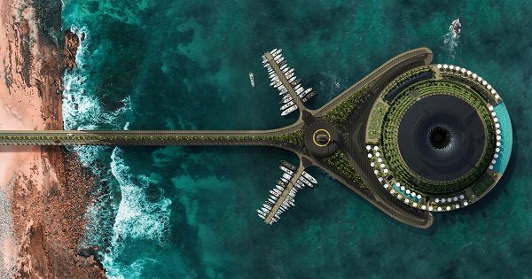 Nhìn từ xa, khách sạn này trông giống một chiếc bánh vòng lớn với nhiều cây xanh bao phủ mặt ngoài.