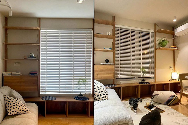 Phòng khách không có ban công hay cửa sổ kính suốt từ trần đến sàn nhưng chủ nhà đã thiết kế một bộ tủ thấp ngay dưới bậu cửa sổ, có thể dùng làm chỗ ngồi và kệ đựng đồ.