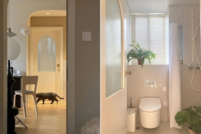 Phòng tắm được ngăn thành khu vực khô và ẩm ướt, khu vực khô đối diện với lối vào bếp.