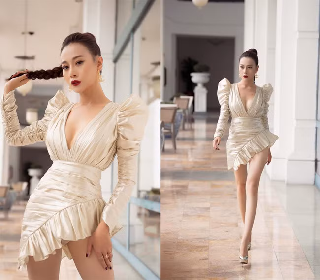 Phương Oanh khoe vòng 1 gợi cảm, vòng eo con kiến và đôi chân thon dài trong bộ váy ngắn sexy khi đi dự họp báo ra mắt phim "Lựa chọn số phận".