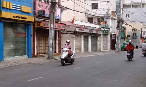 Tai sao nguoi Sai Gon, Ha Noi dong cua mung 1 Tet?