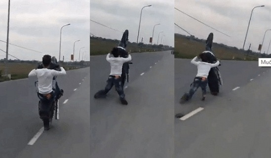 Hiện tại đoạn clip lạng lách, đánh võng khi đi xe máy trên đường của đôi nam nữ này đang thu hút sự chú ý của cư dân mạng. Ảnh: Chụp màn hình