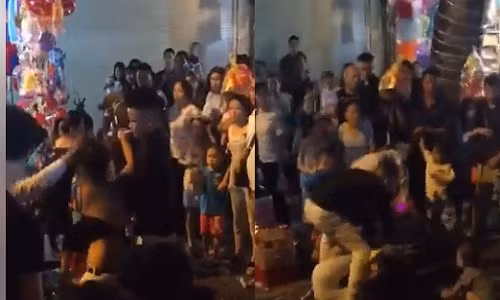 Loi khai cua co gai bi lot do van xong vao danh nhau o pho Hang Ma