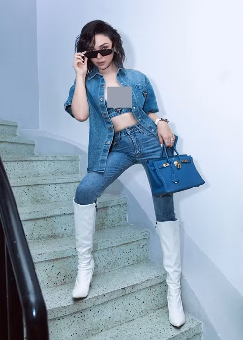 Có thời gian, Quỳnh Thư vướng tin đồn hẹn hò người mẫu Doãn Tuấn, cầu thủ Tiến Linh. Đối mặt với nghi vấn tình cảm với Doãn Tuấn, Quỳnh Thư lên tiếng phủ nhận còn tin đồn với Tiến Linh, cô tỏ ra khó chịu. Ảnh: FB Quỳnh Thư