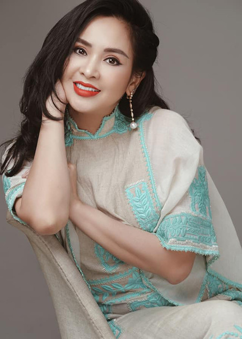 Nhan sắc của vợ cũ nhạc sĩ Quốc Trung vốn tươi trẻ.