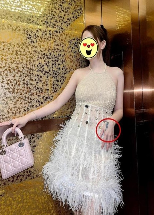 Nhiều fan đoán già đoán non người trong clip có thể là bạn gái Chi Dân. Đáng chú ý, dựa vào hình xăm trên tay người trong clip, cư dân mạng soi ra đó là một cô nàng có tài khoản Facebook tên H.H.L. Ảnh: Thương Hiệu Và Pháp Luật.