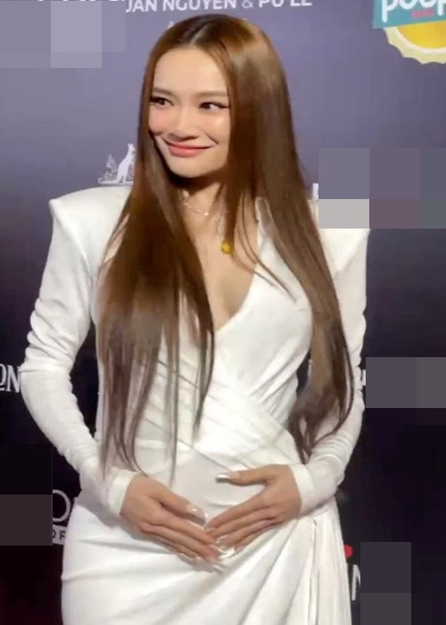 Nhã Phương gợi cảm mọi ánh nhìn dù đang mang bầu. Ảnh: Thương Hiệu Và Pháp Luật.