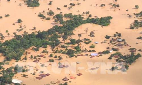 Sự cố vỡ đập thủy điện Sepien Senamnoi ở Lào. Ảnh: TTXVN