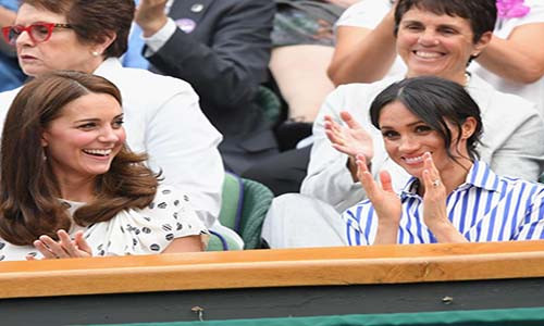 Công nương Kate và Meghan Markle vỗ tay khi xem trận đấu. Ảnh: Cosmopolitan.